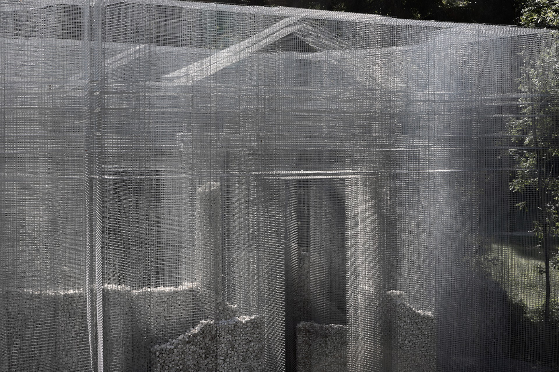 edoardo tresoldi suspends mesh and metal architectural ruins