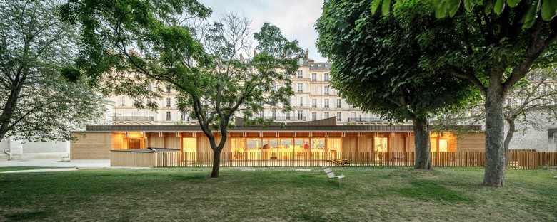 Atelier Régis Roudil Architectes designs a nursery in wood and raw earth in Paris

