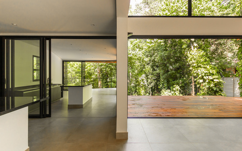 BD House by Frederico Trevisan, urban home meets forest and family