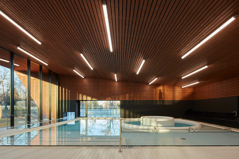 dkarchitekti studio’s indoor swimming pool in Louny aims to encourage physical activity
