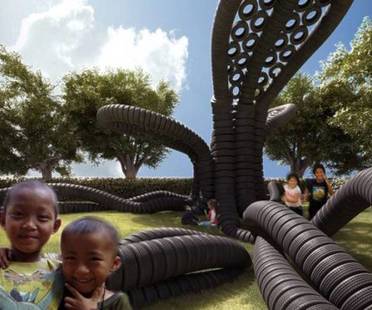 Reused tires create playground for refugee children