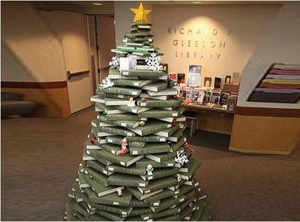 A green Christmas tree made of library books!
