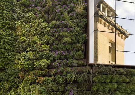 Vertical garden to integrate the existing building and the add-on

