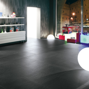 Light effects on porcelain surfaces: Pietra di Brera and Grafite
