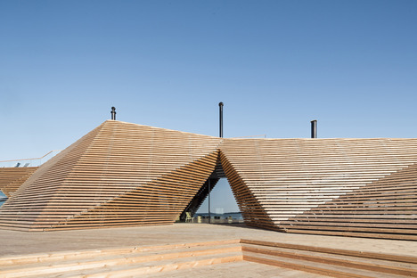 Avanto Architects creates a dome made of strips of wood for a restaurant with a sauna 

