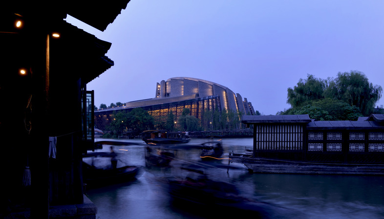 The brickwork, steel and glass Wuzhen Theatre by Kris Yao
