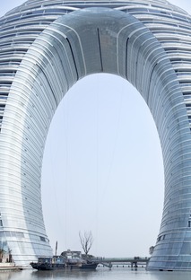 MAD’s ring-shaped Sheraton Hotel made of concrete, glass and aluminium 
