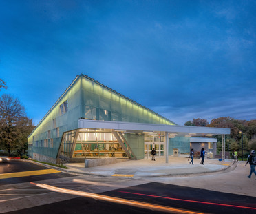 A translucent façade with neon lighting for Carrollton Library
