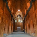 Wallmakers designs a church with catenary arches in clay bricks
