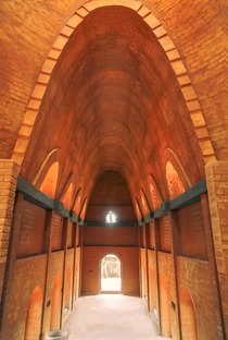 Wallmakers designs a church with catenary arches in clay bricks
